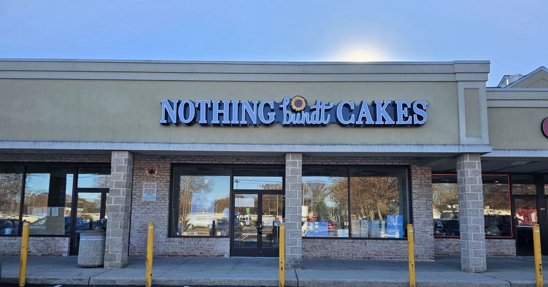 A Storefront with a sign that says nothing bundt cakes