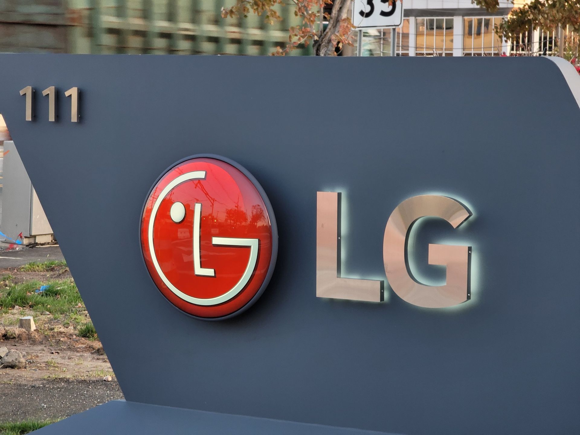 A large lg sign that is outside of a building