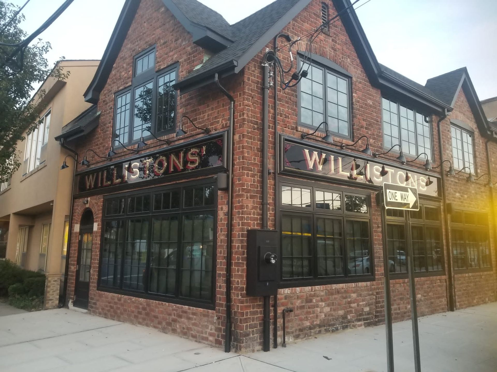 A brick building with a sign that says willistons