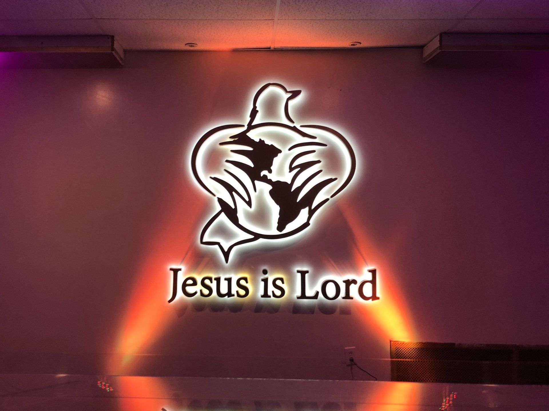 A sign that says jesus is lord on it