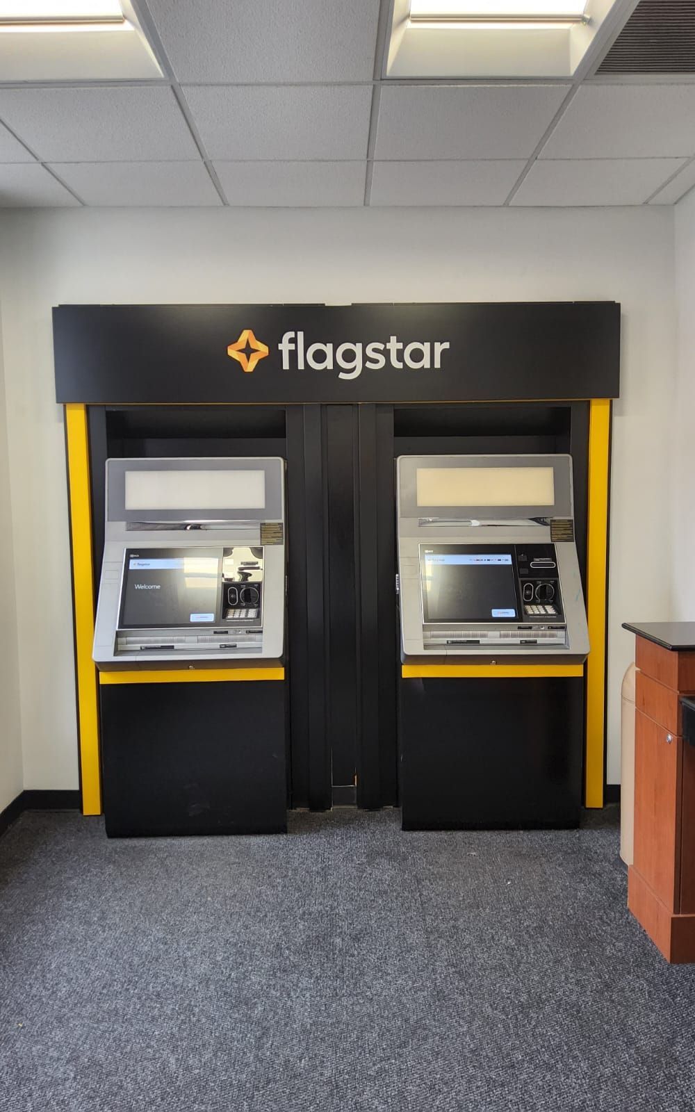 flagstar interior signage above atm machines