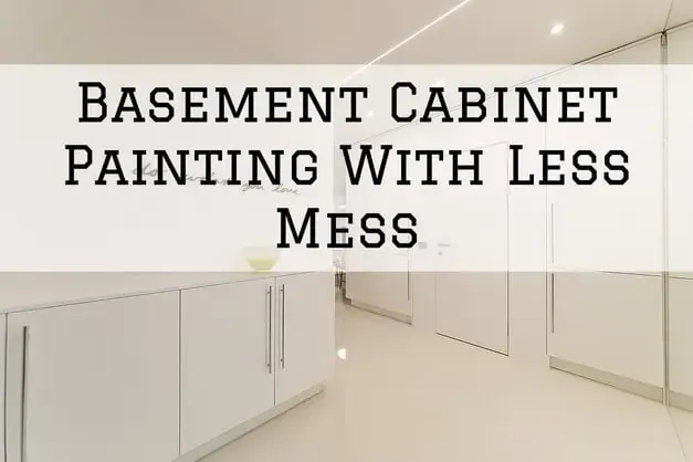 Basement cabinet painting with less mess, showing white cabinets in a clean workspace.