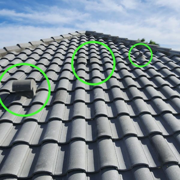 A roof with shingles being installed on it