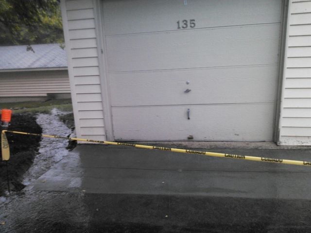 a garage door with the number 135 on it