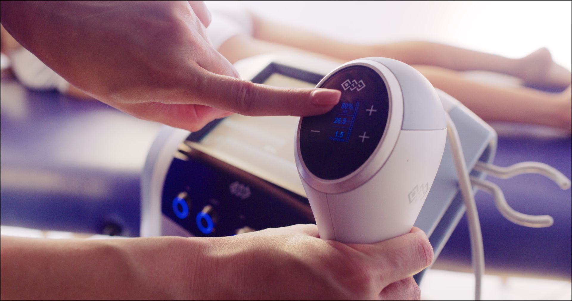 A person is pressing a button on a machine.