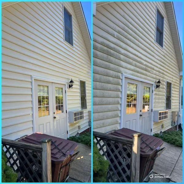 Side-by-side view of a house's exterior, before (yellow) and after (clean) pressure washing.
