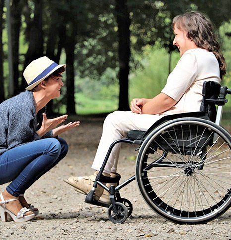 Woman sitting on a wheelchair