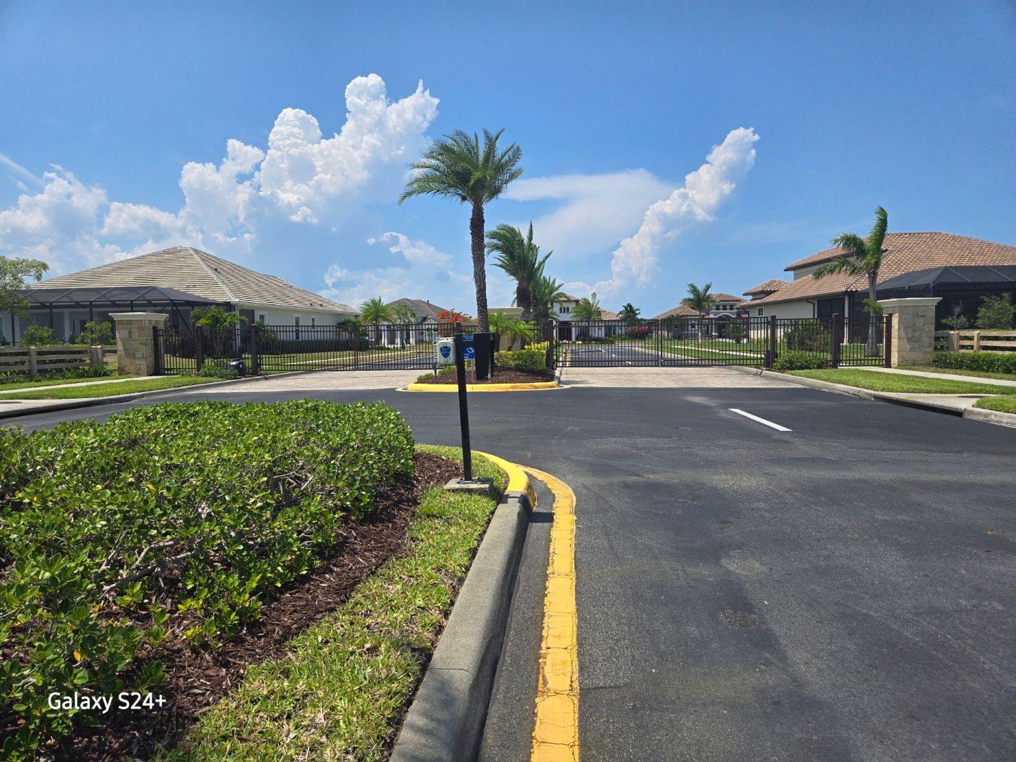 A road with a yellow line on the side of it