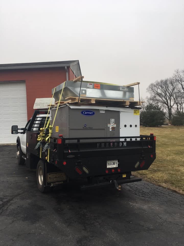A truck with a box on the back of it