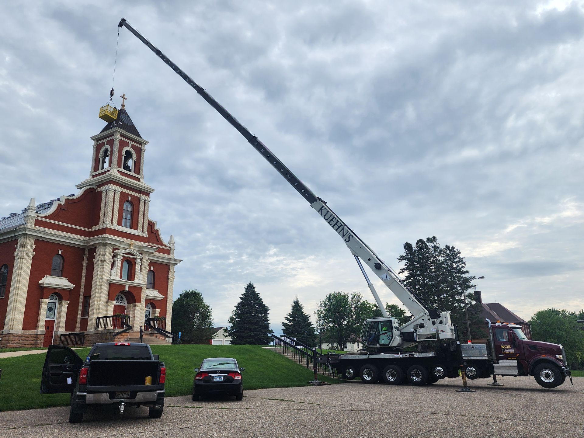 Large Cane is lifting  infront of church building