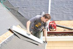 Man repairing the roof