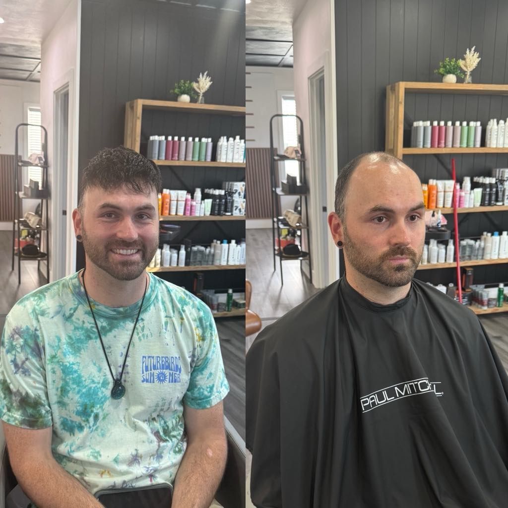 Man with short, textured hair smiles on the left and shaven head on the right, sitting in a salon with product shelves.