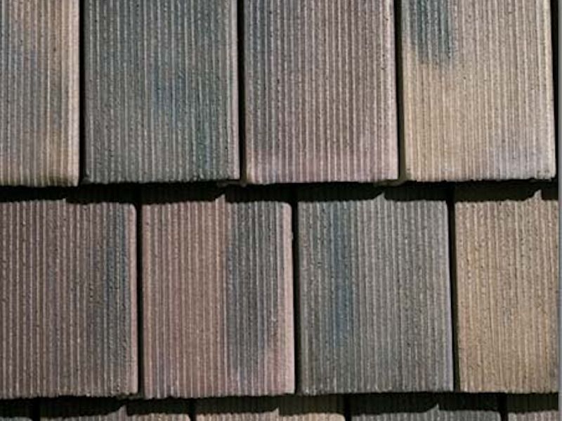 Oakwood - Brushed shake style antique sprayed black #1. Laid in a random pattern.