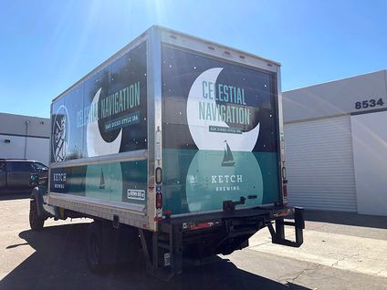 Box truck parked in an industrial lot with Best in Navigation and Ketch branding on the side panels