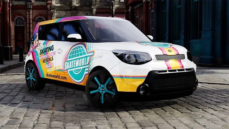 Colorful customized compact SUV parked on cobblestones in front of a building