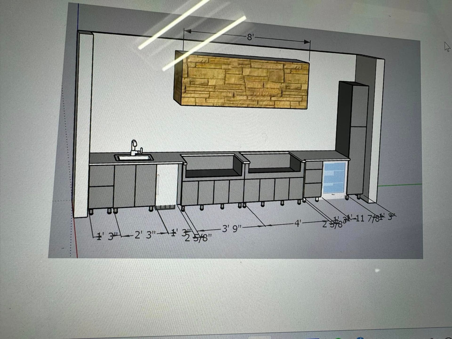 Outdoor kitchen rendering with cabinets, sink, grill area, refrigerator, and decorative stone overhead.
