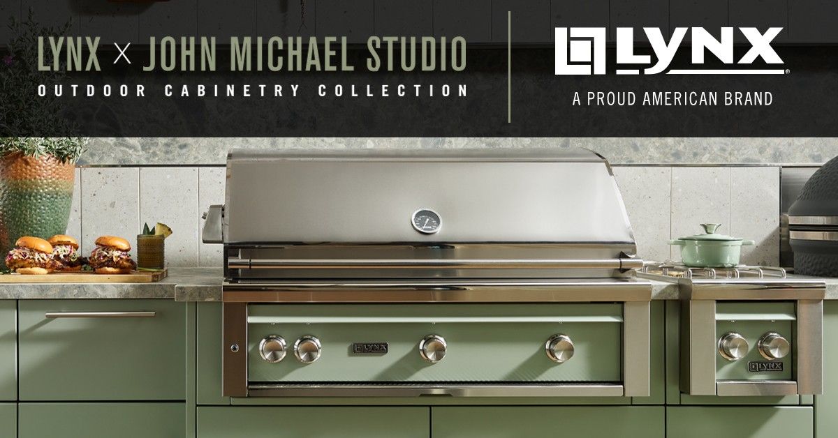 Stainless steel Lynx outdoor grill and cabinetry in a green kitchen setting.
