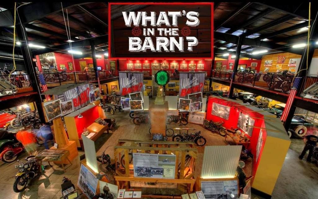 A large room with a sign that says what 's in the barn