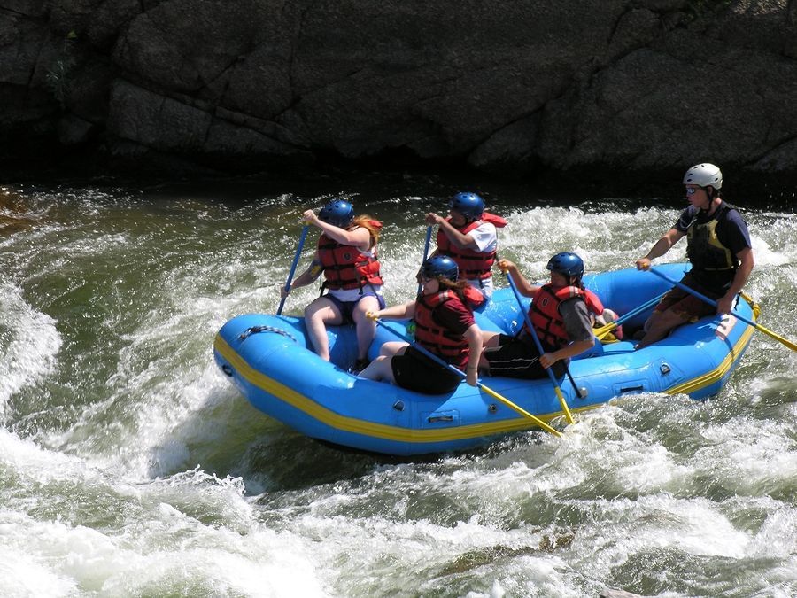 A group of people are rafting down a river.