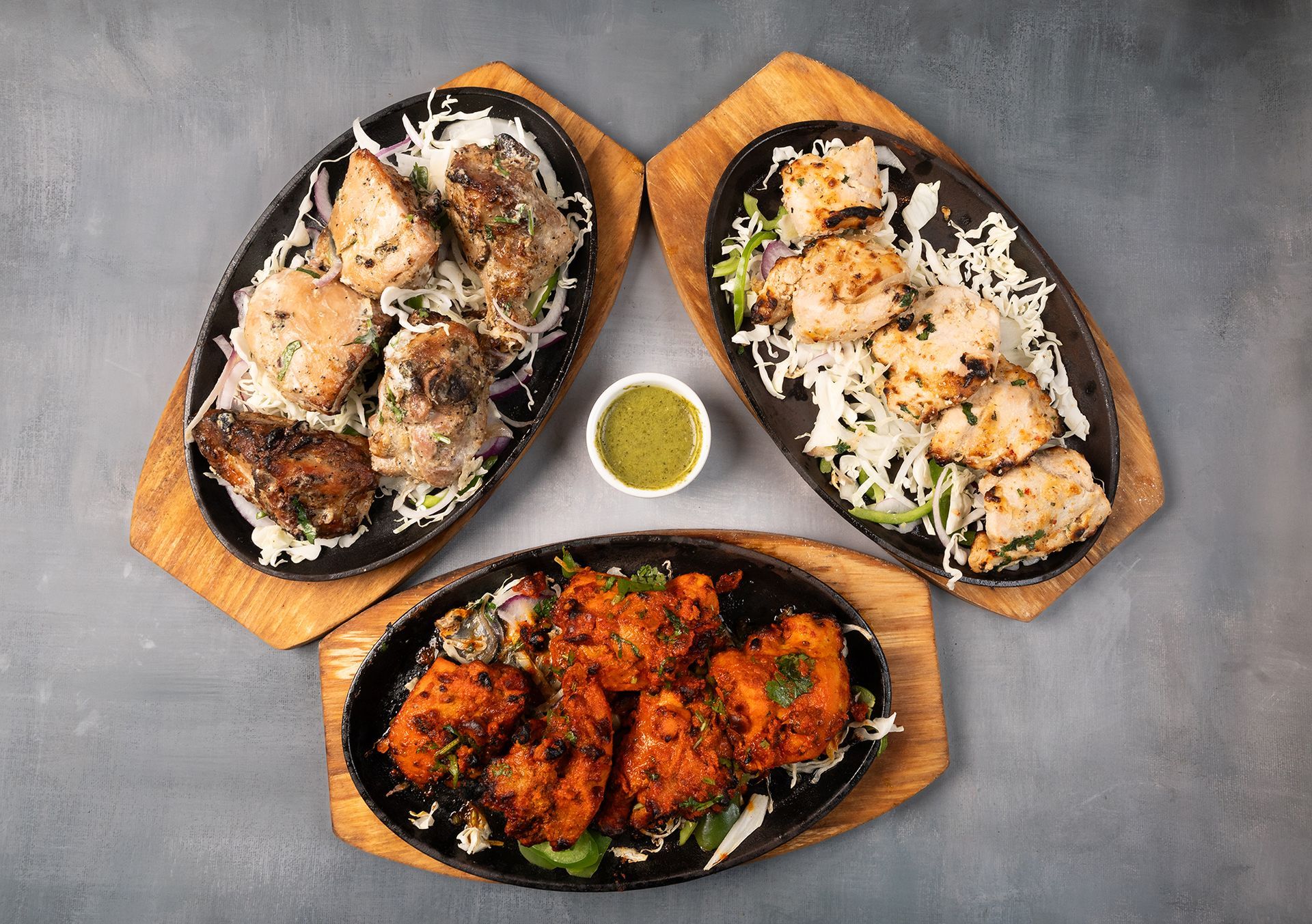 A close up of a plate of food with onions and cheese