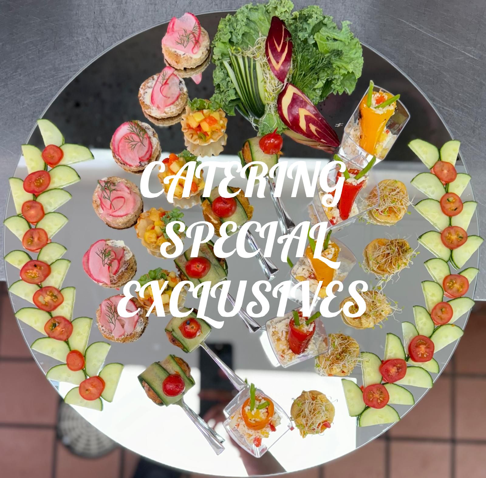 A plate of food with the words catering special exclusives on it