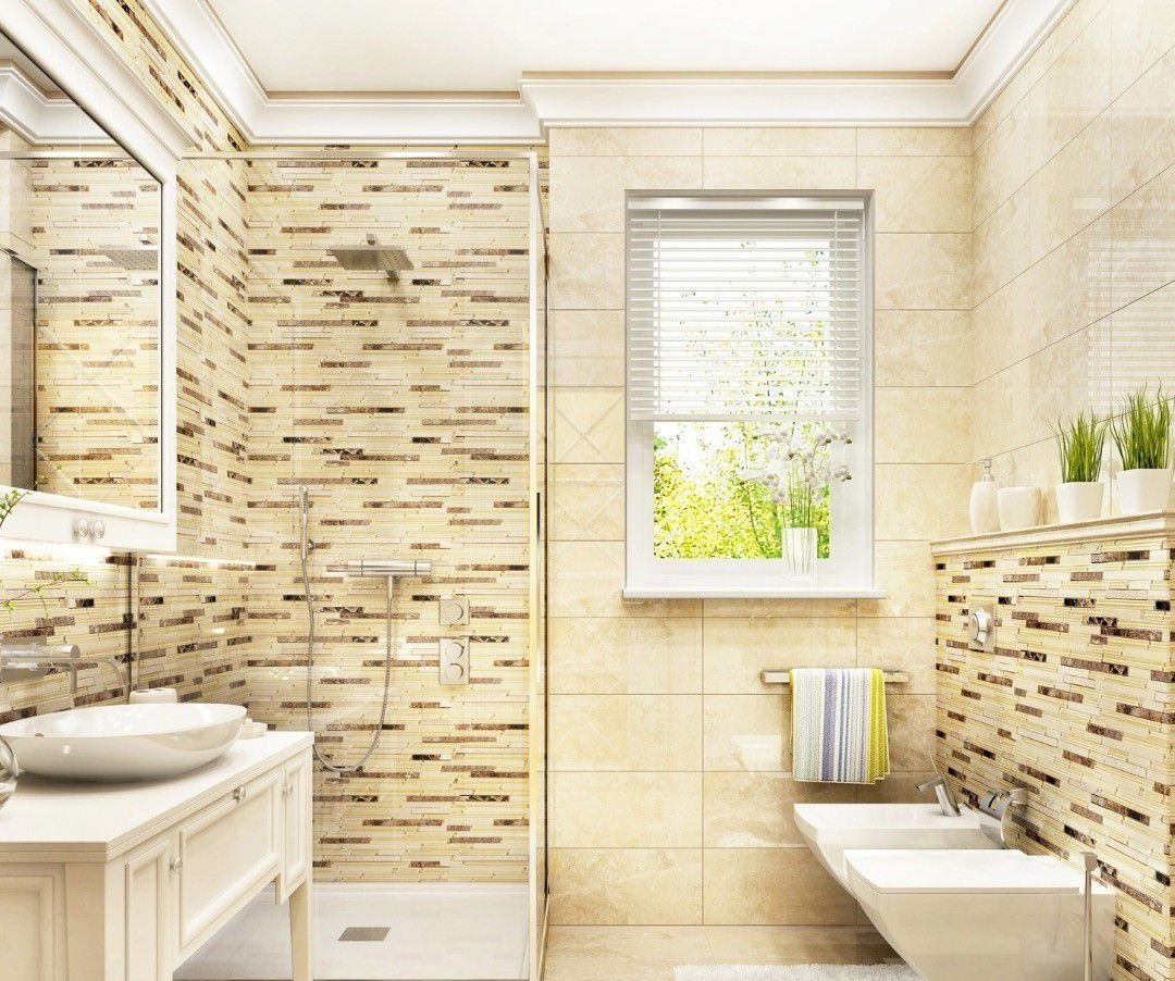 A bathroom with a sink , toilet , shower and window.