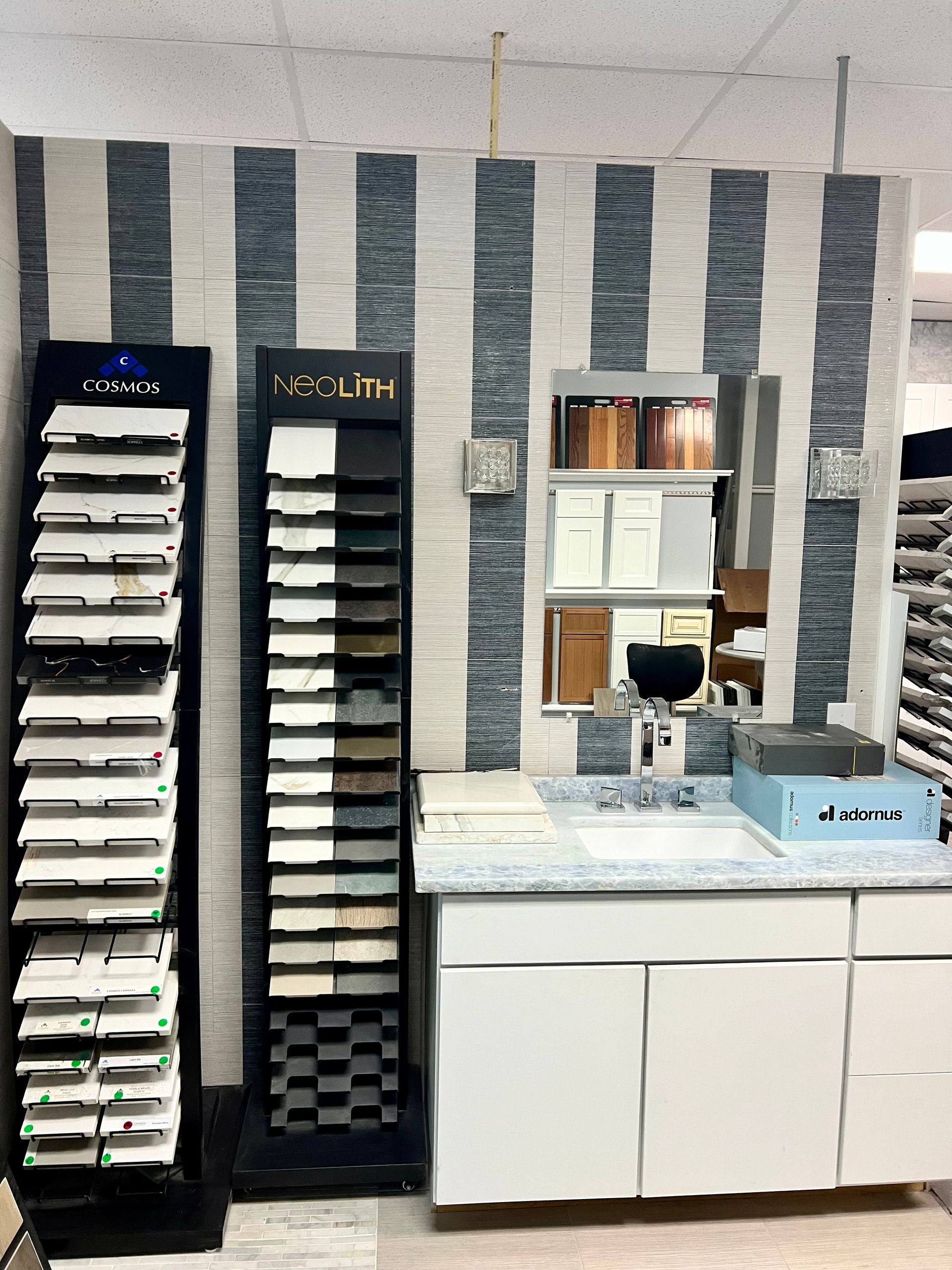 A bathroom with a sink and a display that says hi-tech