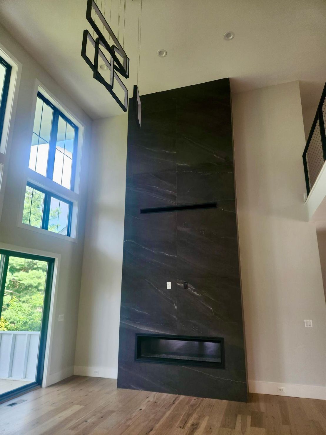 There is a fireplace in the middle of the room.