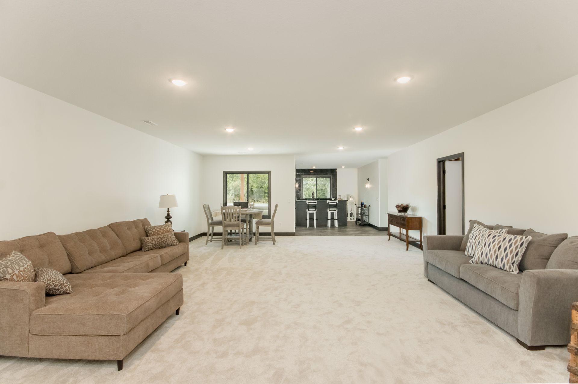 A living room with a couch and a table in it