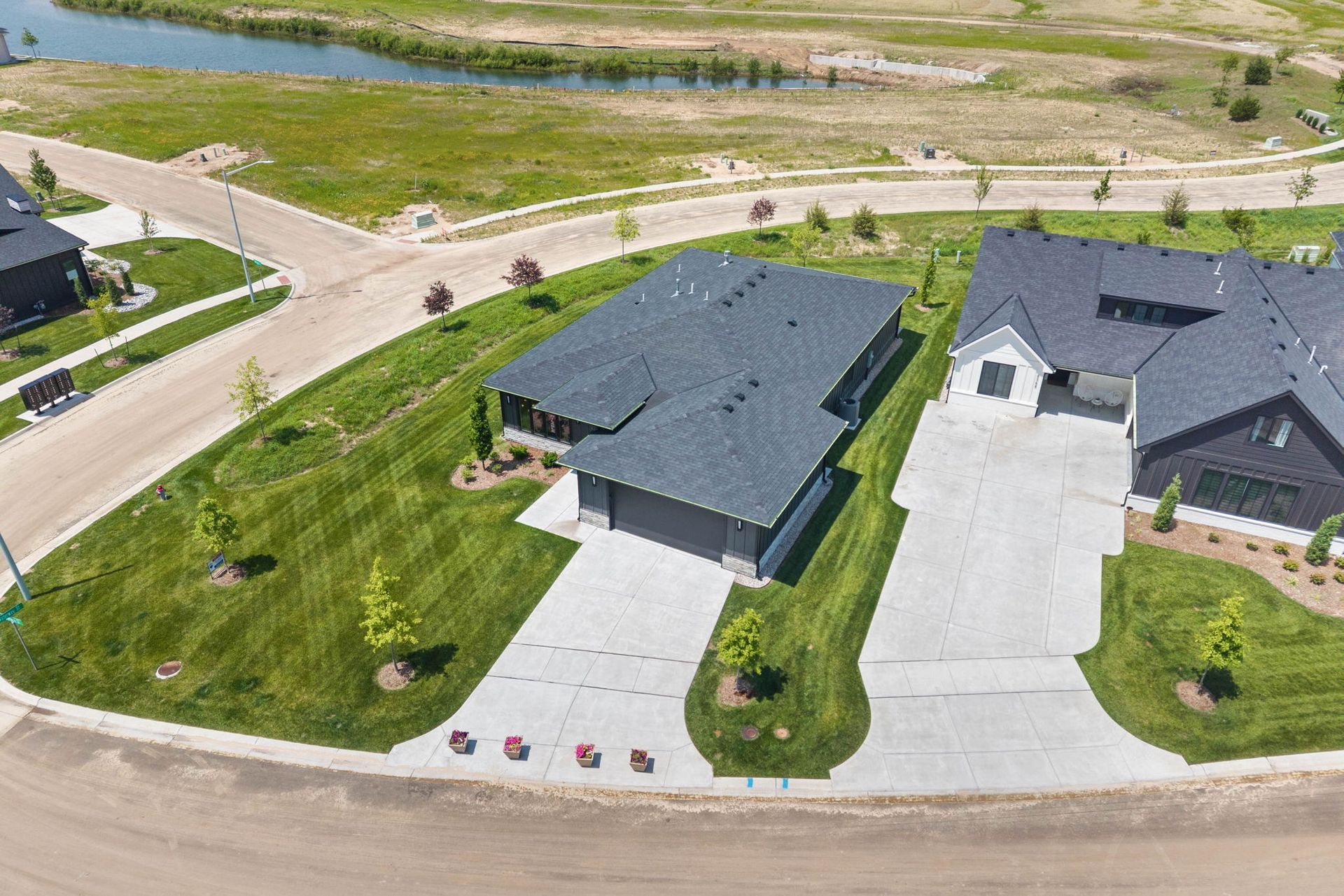 An aerial view of a house in a residential area.