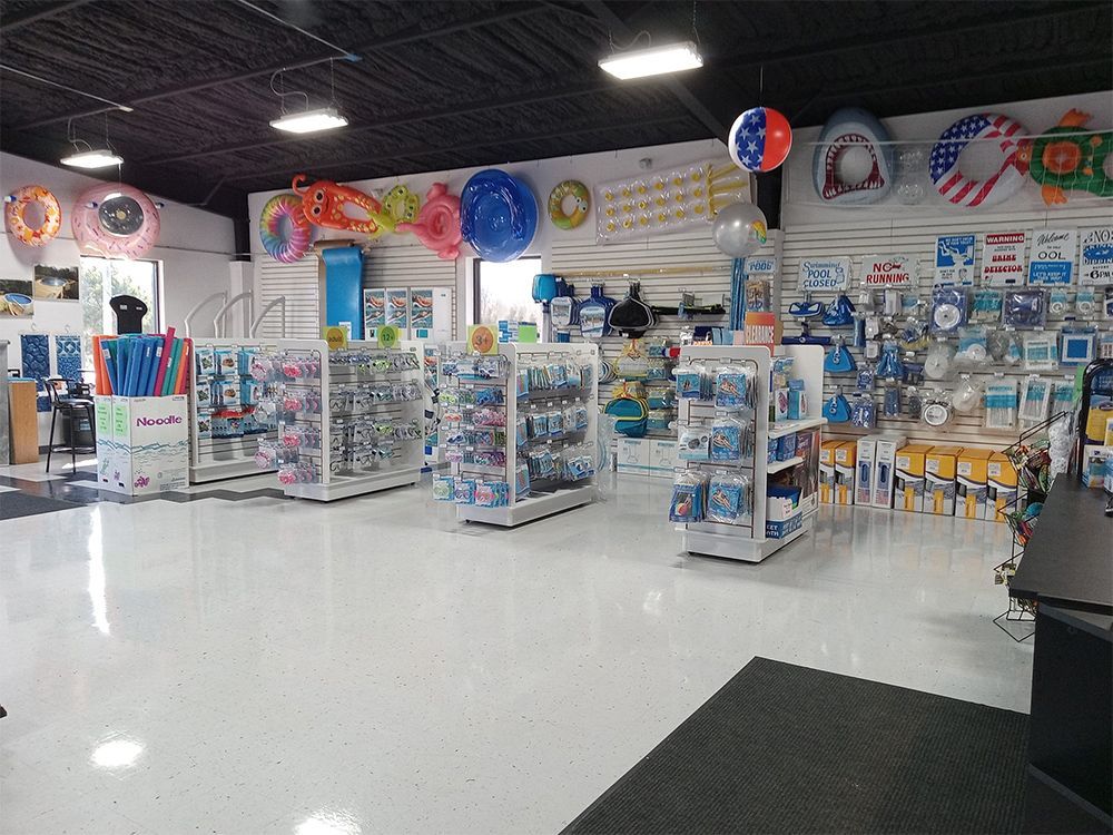 A store filled with lots of pool supplies and toys.