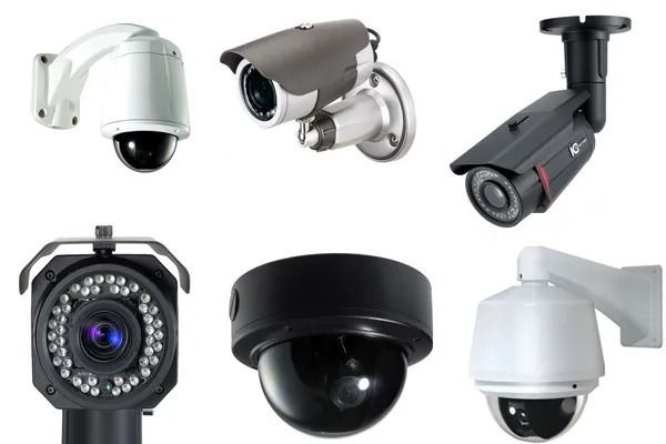Assorted security cameras in white, black, and gray, including dome and bullet styles.