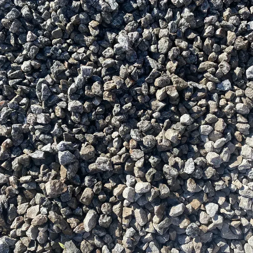Close-up of a pile of gray gravel, varying sizes and tones.