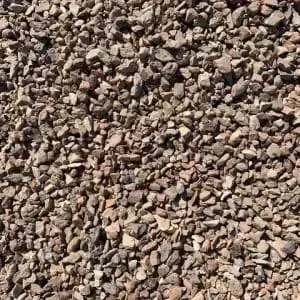 Pile of small, gravel-like rocks, varying shades of brown and gray.
