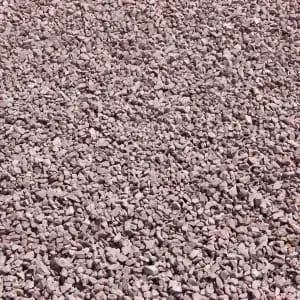 Close-up of a pile of small, light-colored gravel stones.