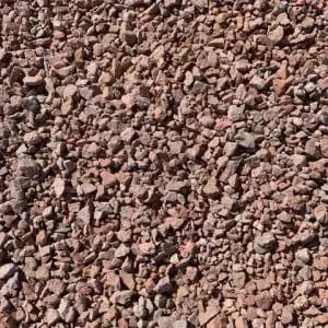 Gravel with reddish-brown tones, consisting of small, irregularly shaped stones.