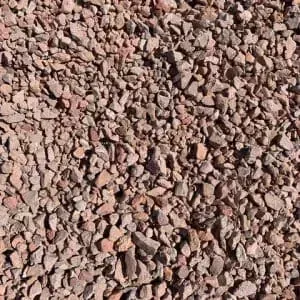 Reddish-brown gravel, a mix of small, angular stones.