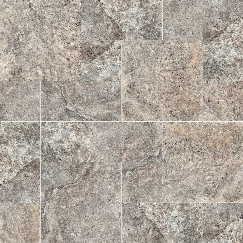 Stone-look tile flooring in shades of gray and beige, with a varied rectangular pattern.