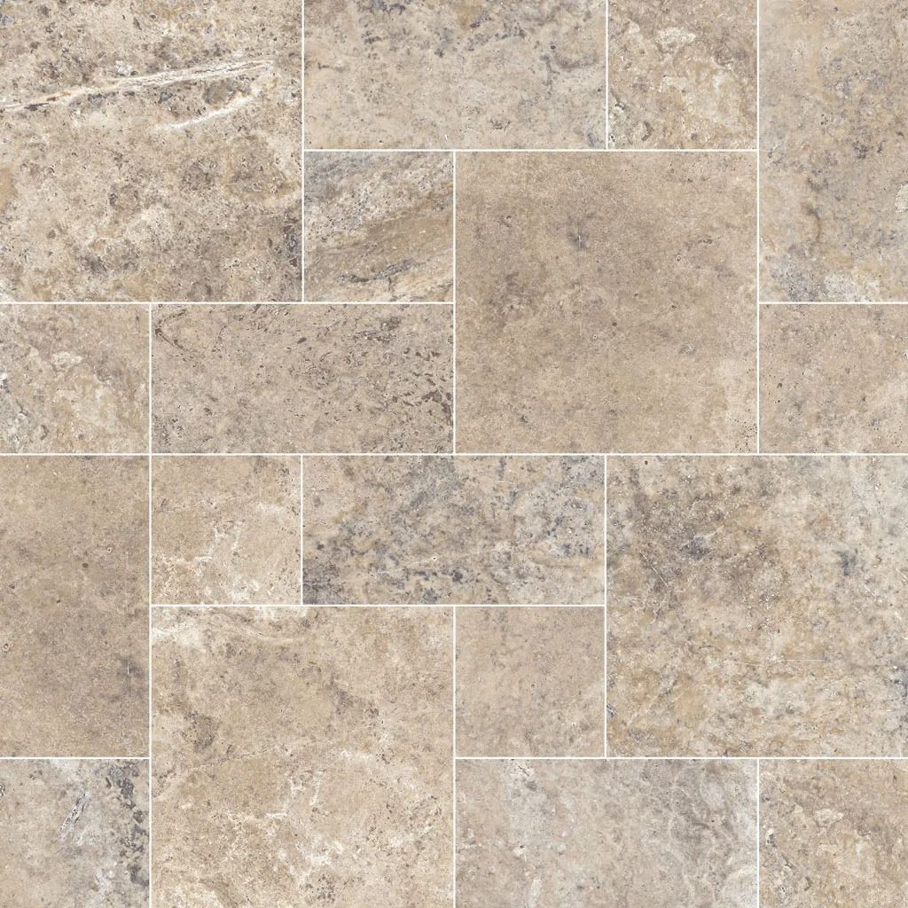 Tan and gray stone tile flooring in a random pattern.