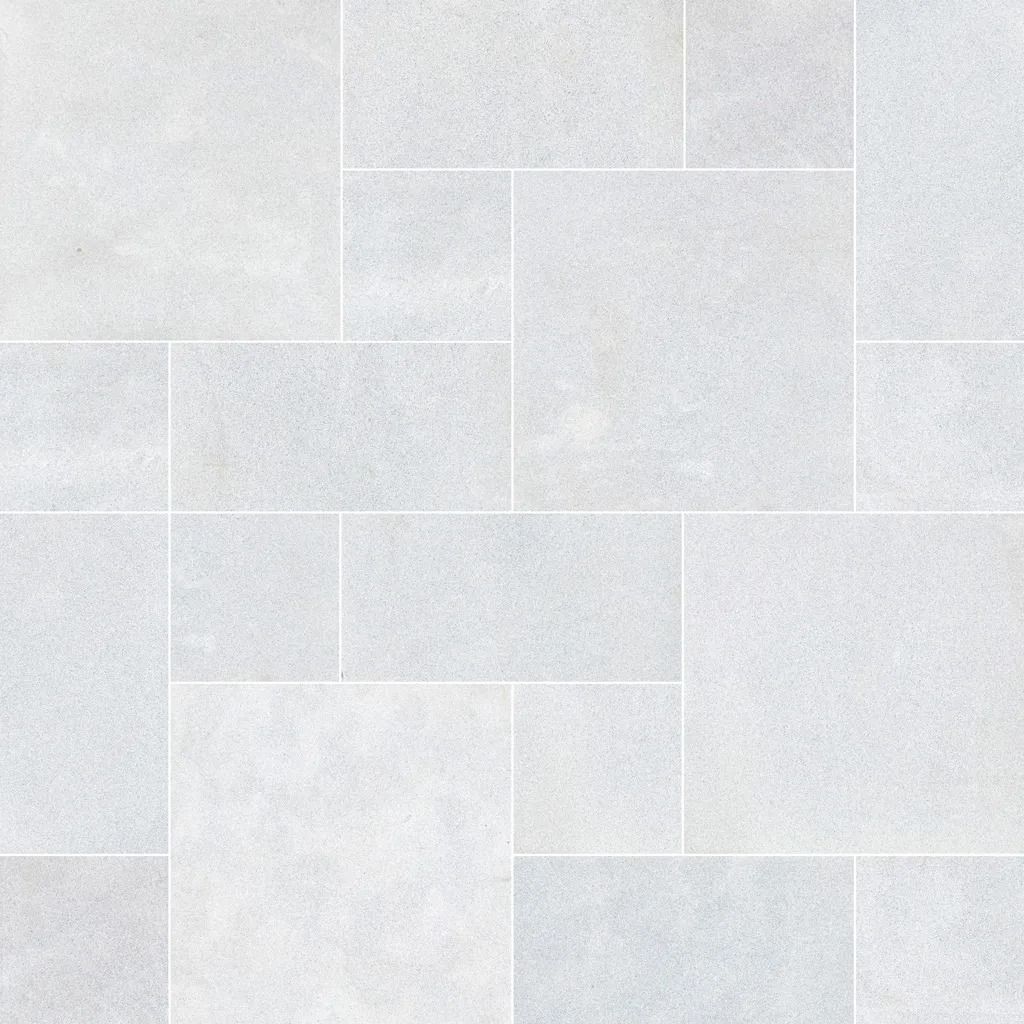 Light gray stone tile flooring in a random rectangular pattern.