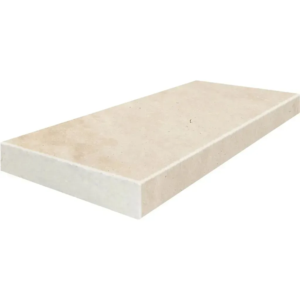 Beige rectangular stone tile with beveled edges.