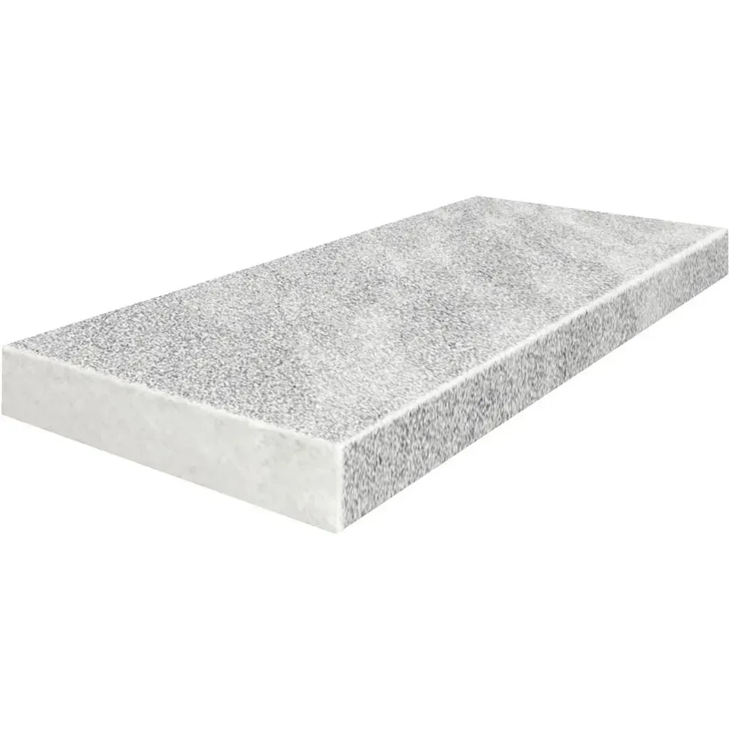 Gray speckled countertop with white edge.