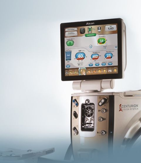 Medical device touchscreen display with colorful controls mounted on stainless steel equipment.