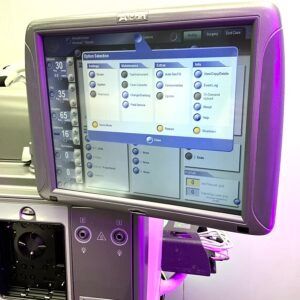 Medical ventilator screen displaying settings menu, with purple side lighting.