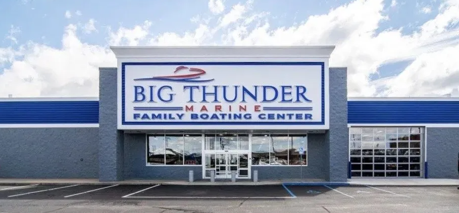Big Thunder Marine family boating center storefront with blue-and-white signage and glass entrance