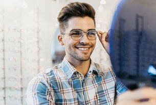 Man wearing his repaired eyeglasses