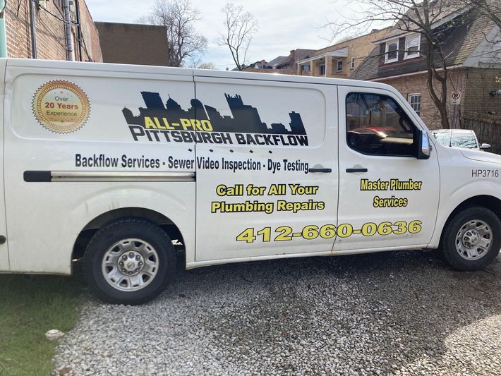 A white van that says all pro pittsburgh backflow