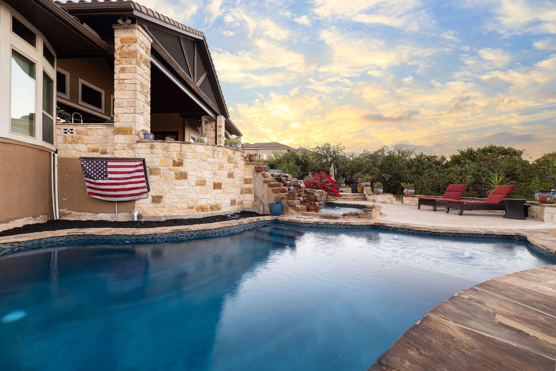 backyard pool at sunset