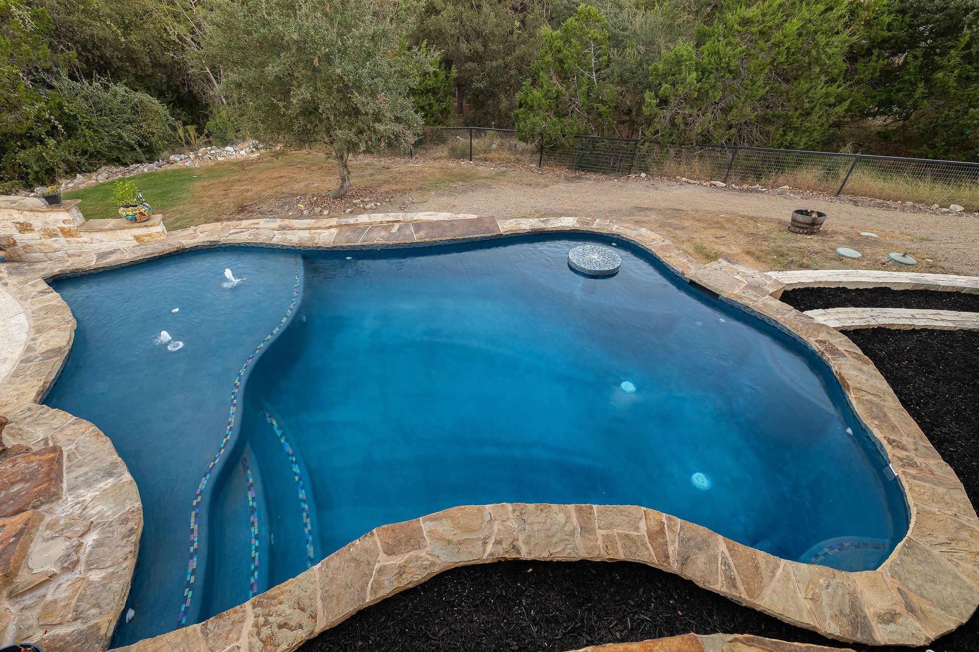 backyard pool at sunset