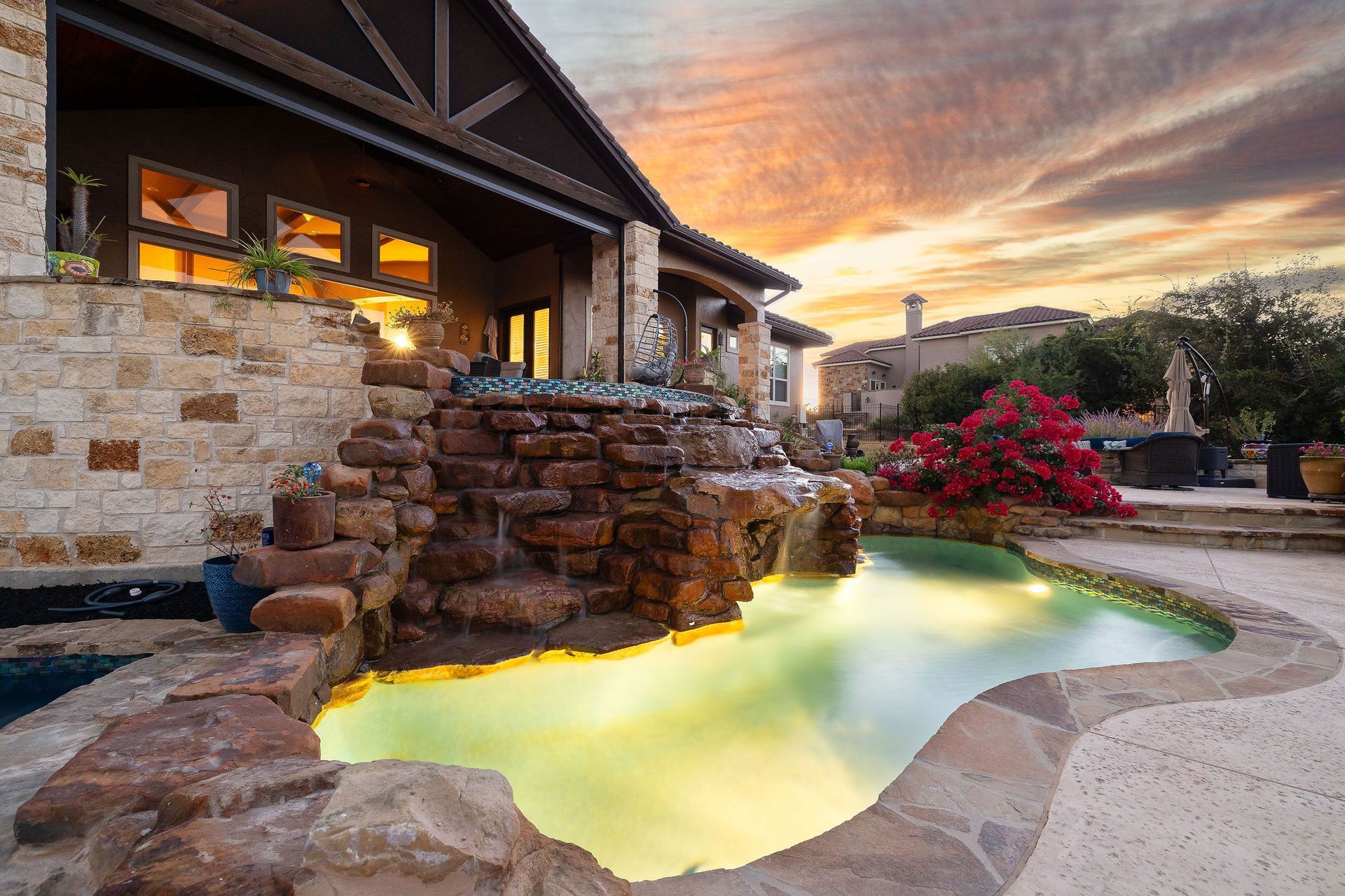 backyard pool at sunset